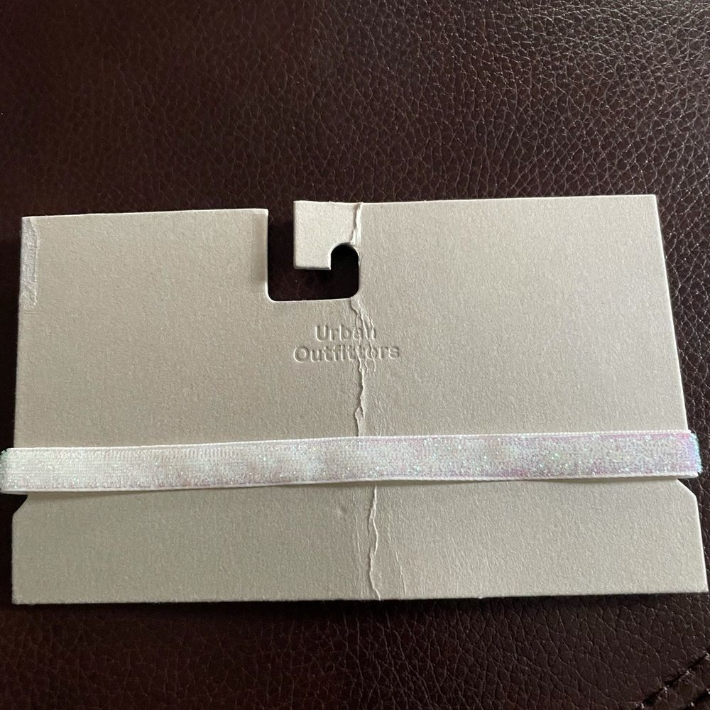 New Urban Outfitters choker necklace. White with sparkle. Smoke free home.NWT